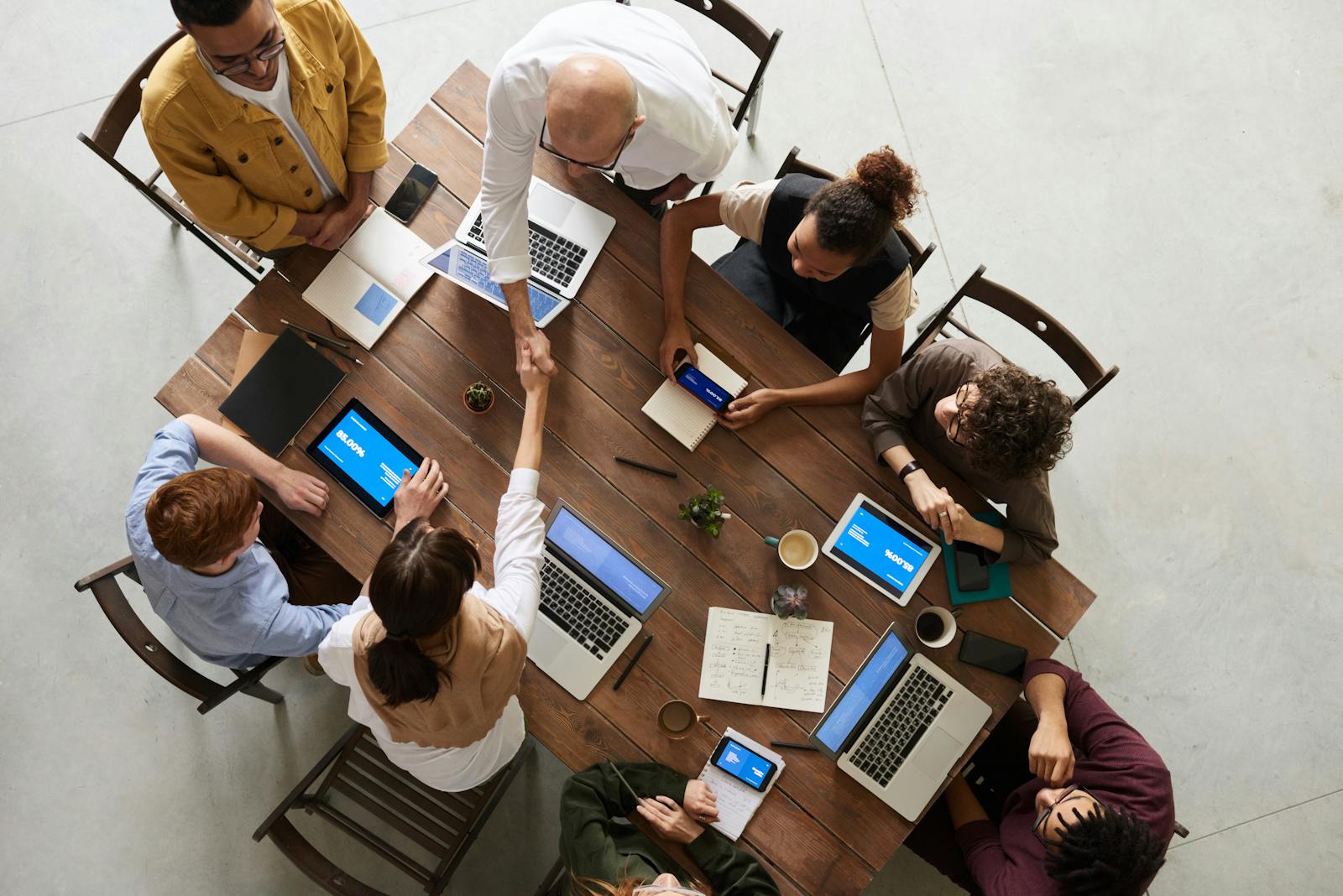 Veterans collaborating at a digital operations center